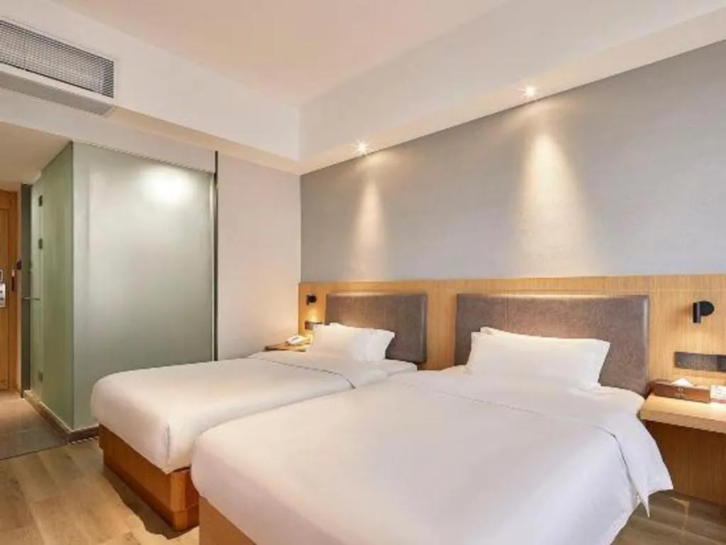 Bed in Insail Hotels Guangzhou Huangpu Dashadi Metro Station