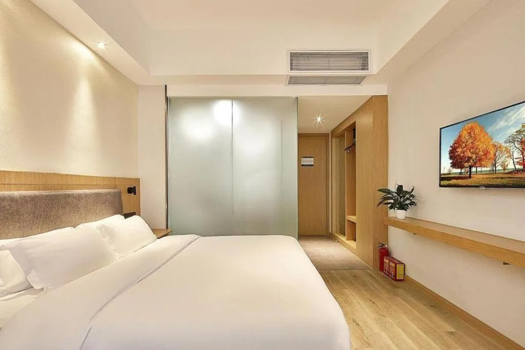 Bed in Insail Hotels Guangzhou Huangpu Dashadi Metro Station