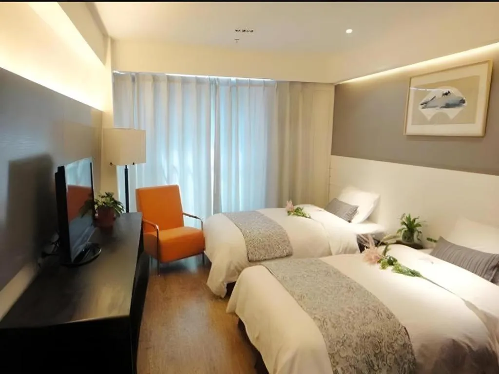 Bed in Tianjin Juchuan Lily Hotel