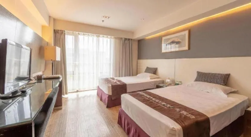 Bed in Tianjin Juchuan Lily Hotel