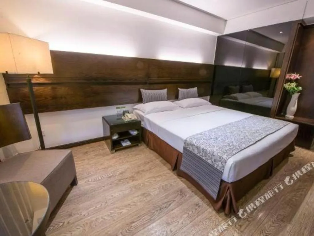 Bed in Tianjin Juchuan Lily Hotel