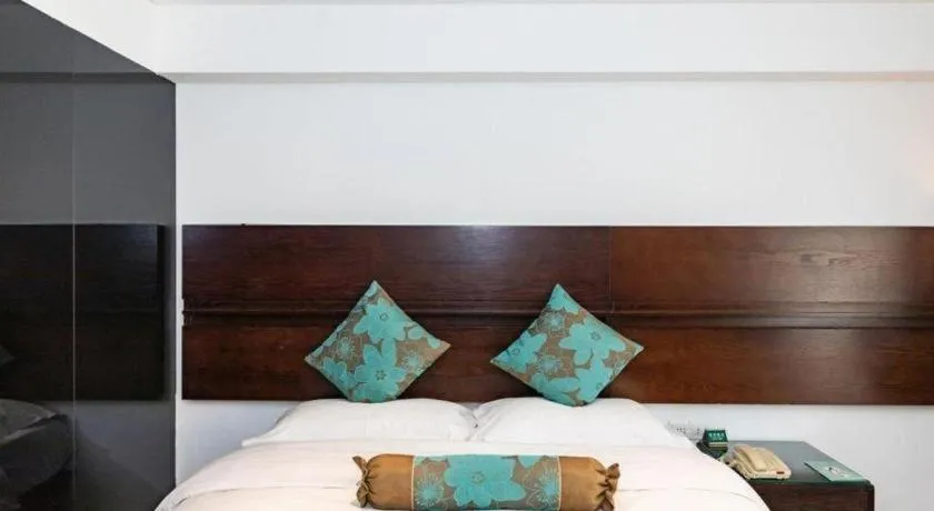 Bed in Tianjin Juchuan Lily Hotel