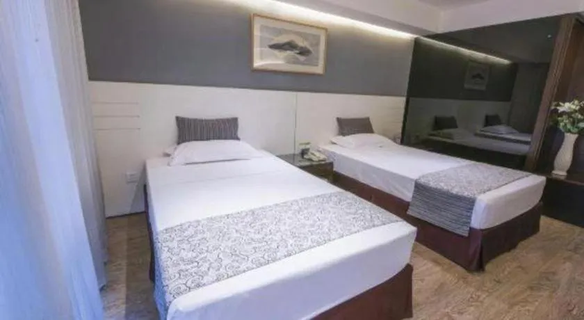 Bed in Tianjin Juchuan Lily Hotel