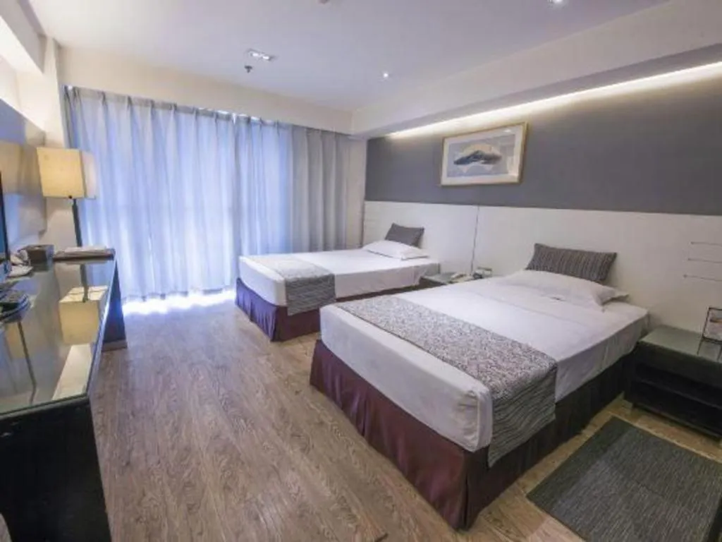 Bed in Tianjin Juchuan Lily Hotel