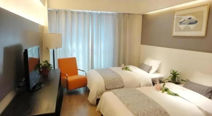 Bed in Tianjin Juchuan Lily Hotel