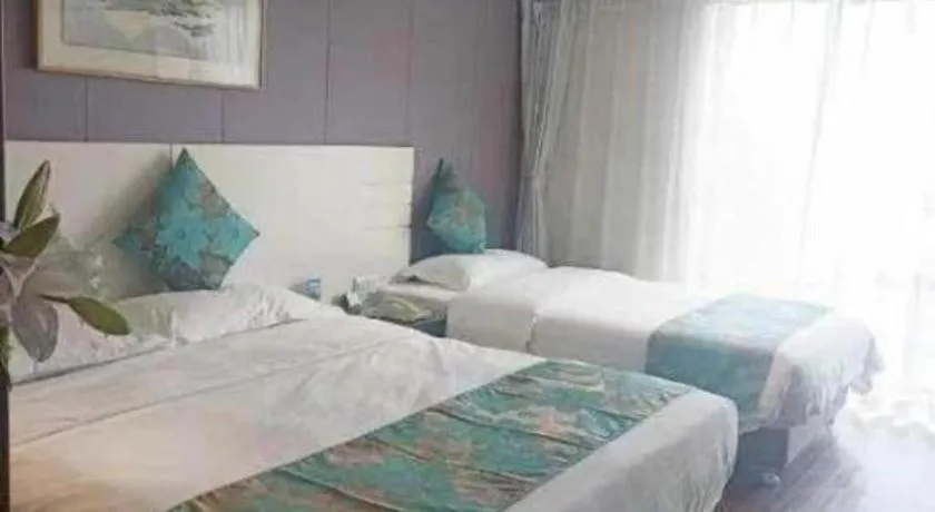 Bed in Tianjin Juchuan Lily Hotel