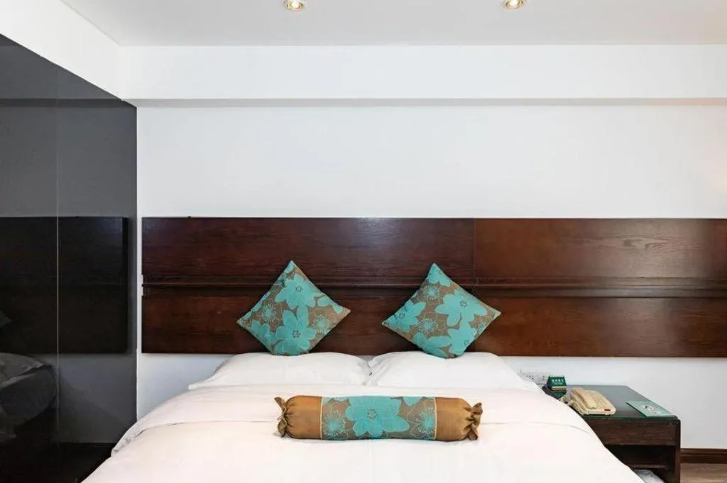 Bed in Tianjin Juchuan Lily Hotel