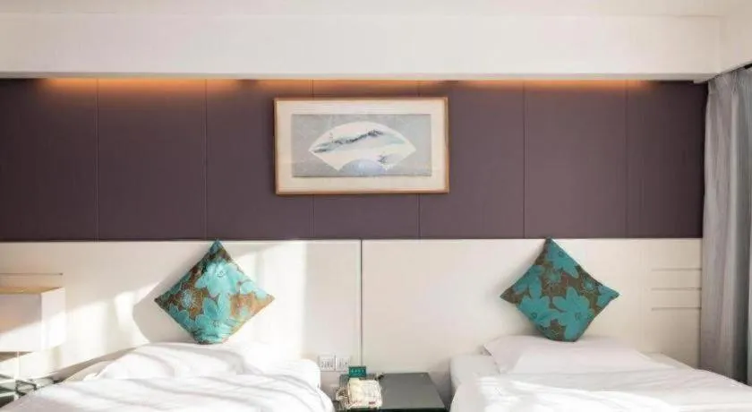 Bed in Tianjin Juchuan Lily Hotel