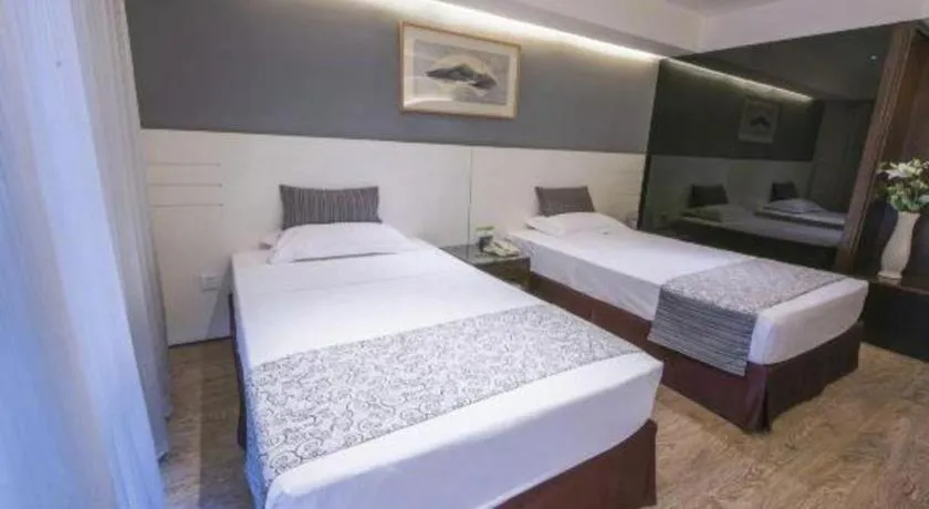 Bed in Tianjin Juchuan Lily Hotel