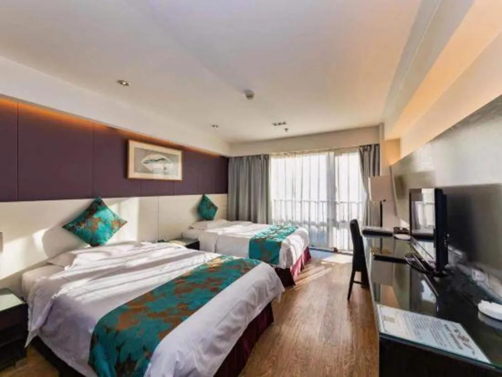 Bed in Tianjin Juchuan Lily Hotel