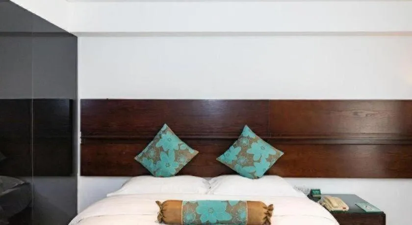 Bed in Tianjin Juchuan Lily Hotel