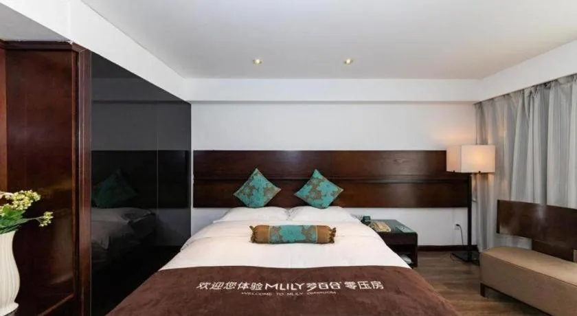 Bed in Tianjin Juchuan Lily Hotel