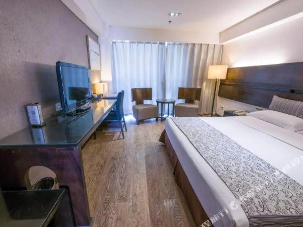 Bed in Tianjin Juchuan Lily Hotel