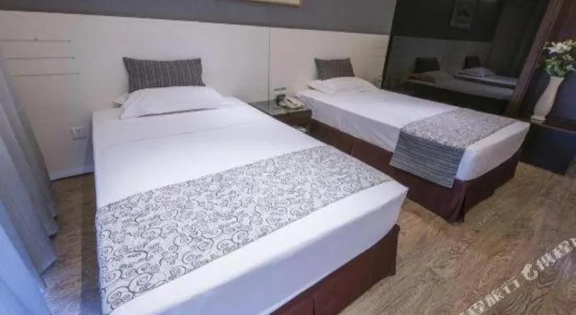 Bed in Tianjin Juchuan Lily Hotel