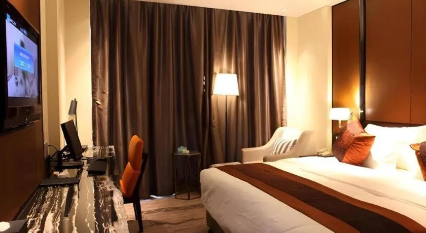 Bed in Excemon Yuyao Hemudu Hotel