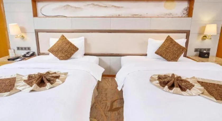 Bed in Mingdu Ziwei Garden Hotel