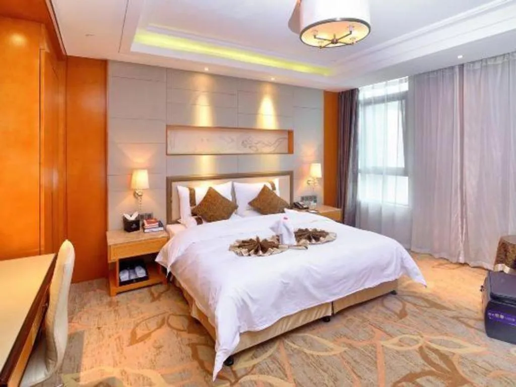 Bed in Mingdu Ziwei Garden Hotel