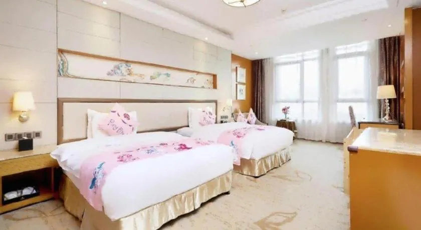 Bed in Mingdu Ziwei Garden Hotel