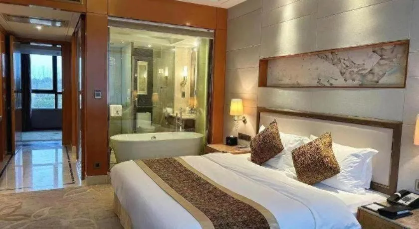 Bed in Mingdu Ziwei Garden Hotel