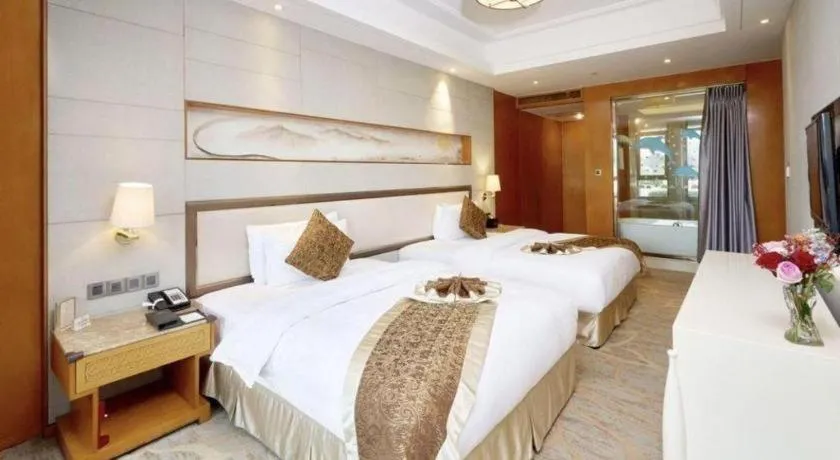 Bed in Mingdu Ziwei Garden Hotel