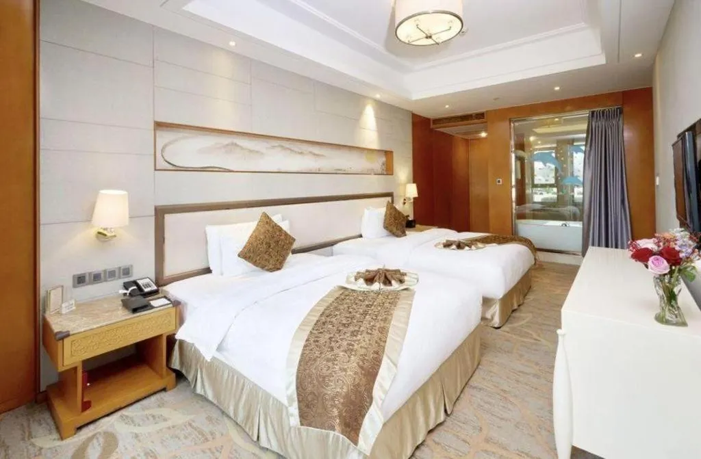 Bed in Mingdu Ziwei Garden Hotel