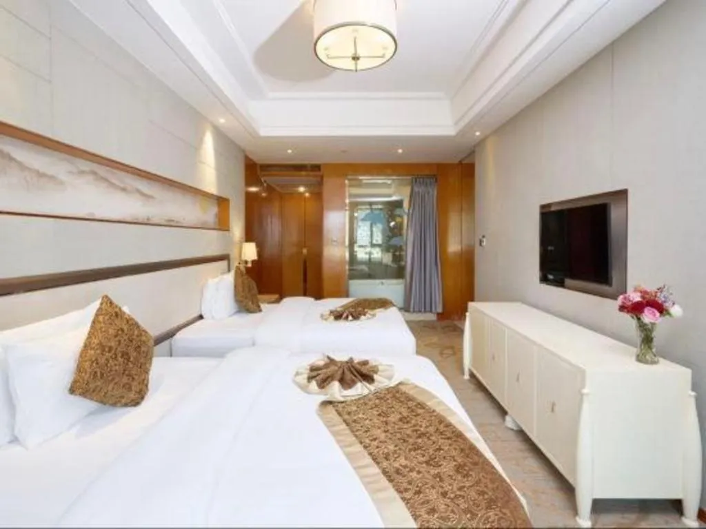 Bed in Mingdu Ziwei Garden Hotel