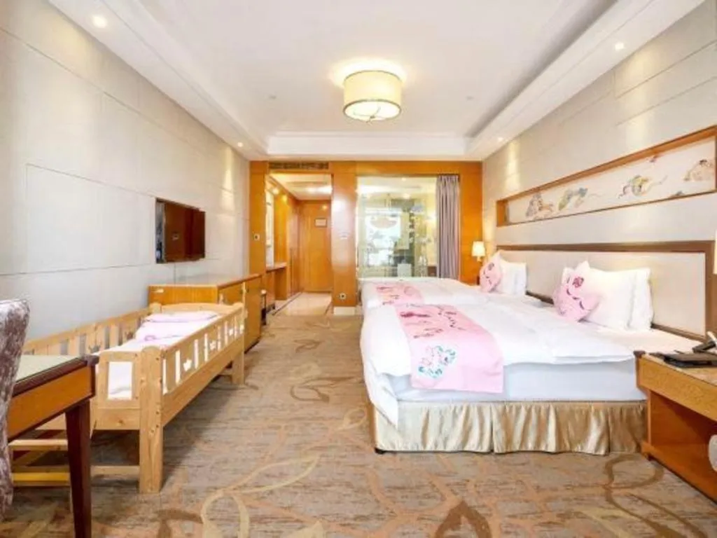 Bed in Mingdu Ziwei Garden Hotel