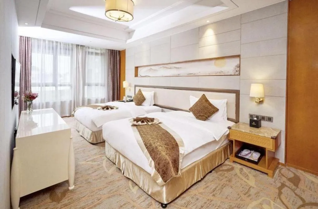 Bed in Mingdu Ziwei Garden Hotel