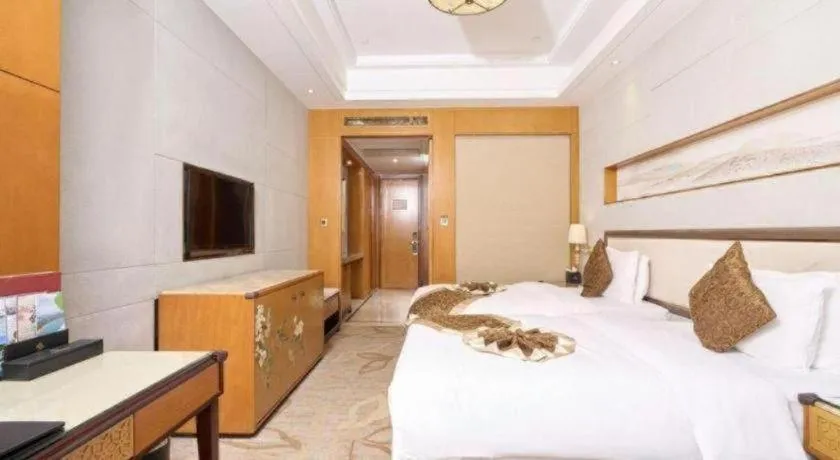 Bed in Mingdu Ziwei Garden Hotel