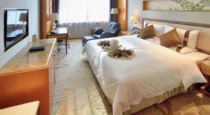 Bed in Mingdu Ziwei Garden Hotel