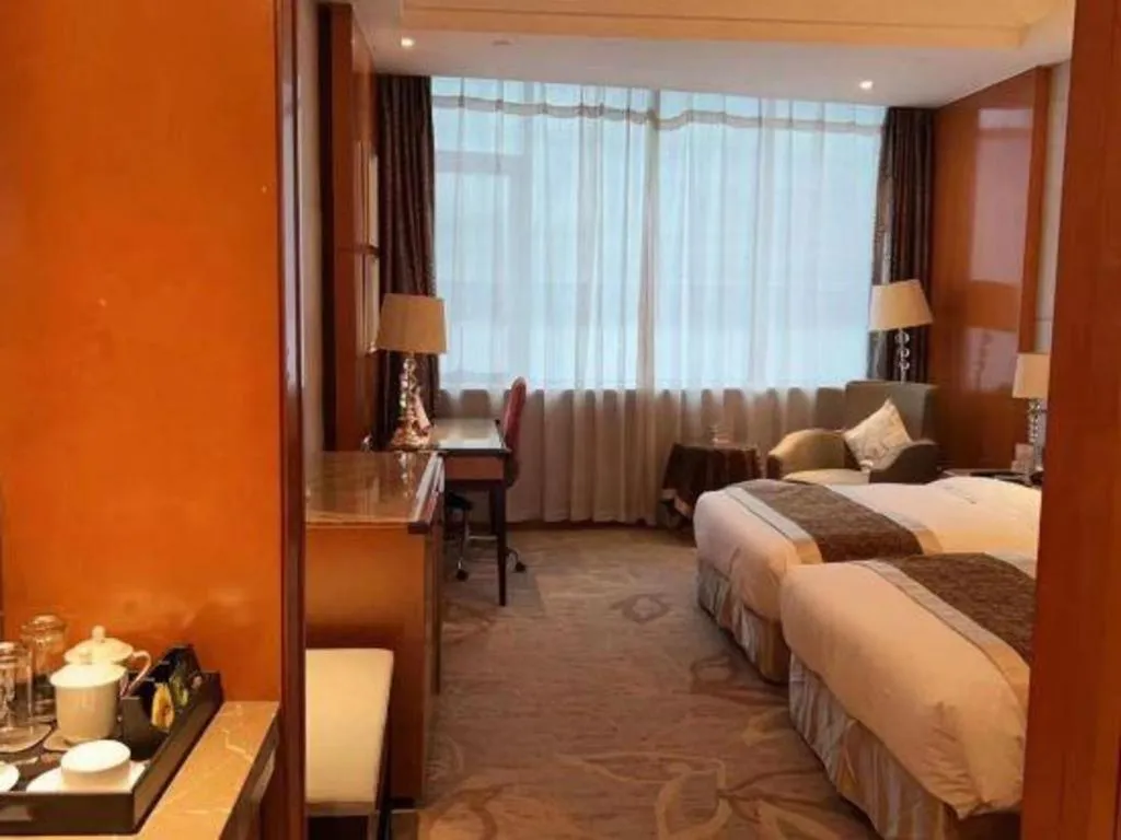 Bed in Mingdu Ziwei Garden Hotel