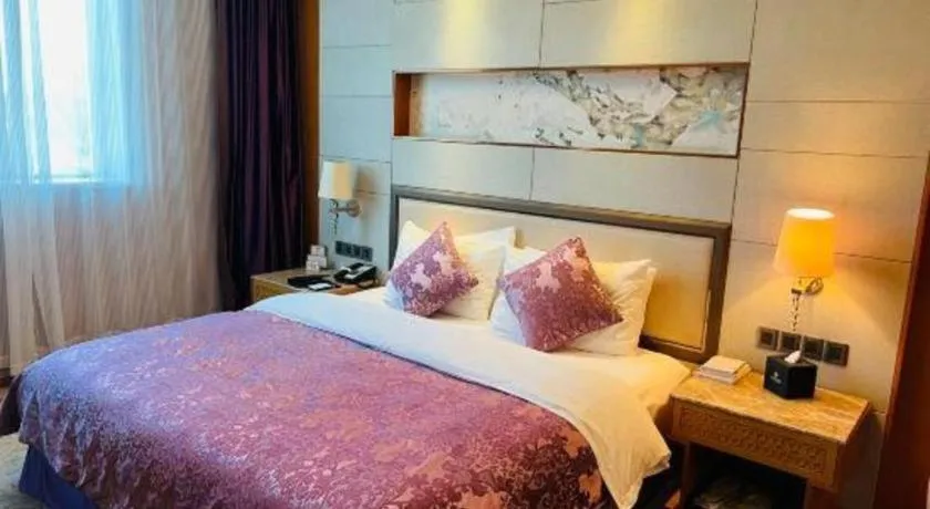 Bed in Mingdu Ziwei Garden Hotel