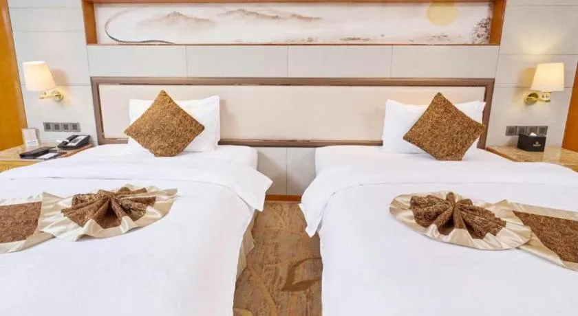 Bed in Mingdu Ziwei Garden Hotel