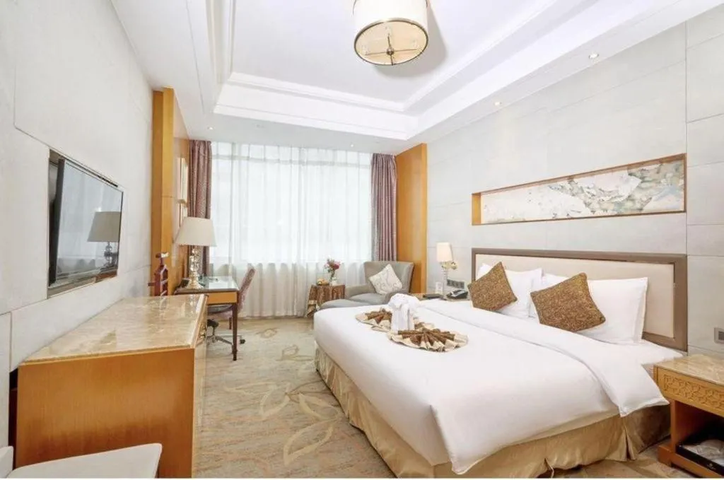 Bed in Mingdu Ziwei Garden Hotel