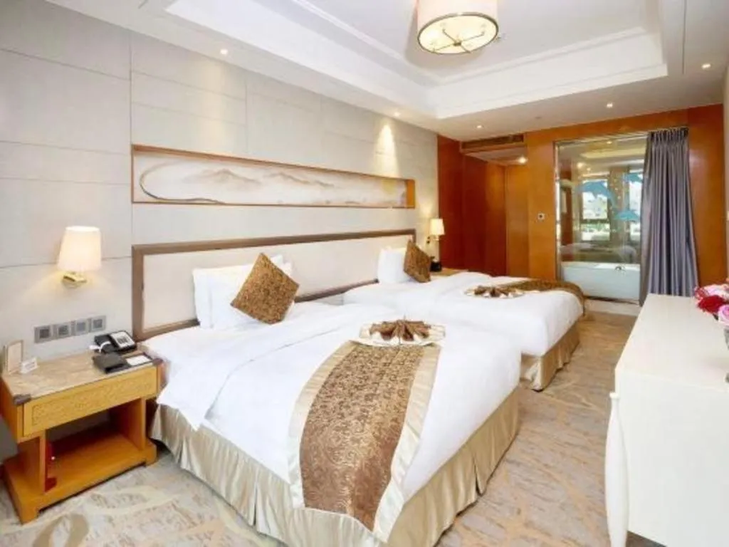 Bed in Mingdu Ziwei Garden Hotel