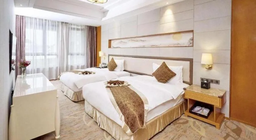 Bed in Mingdu Ziwei Garden Hotel