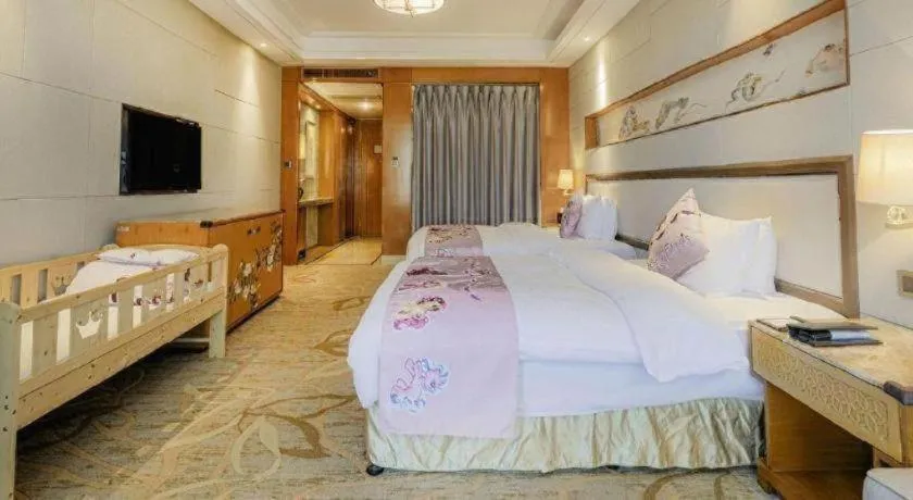 Bed in Mingdu Ziwei Garden Hotel