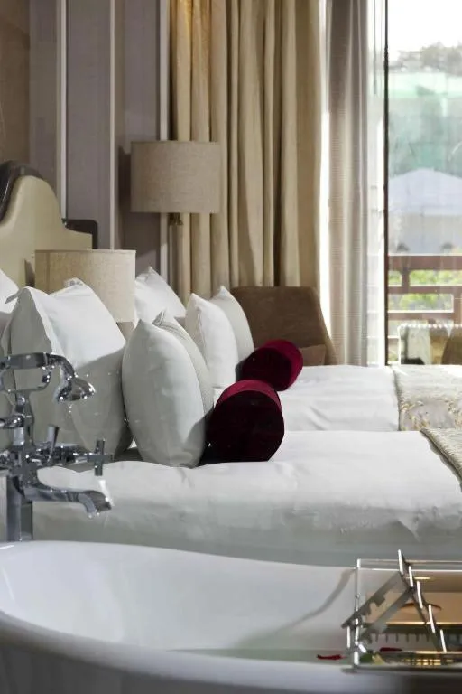 Bed in Grand Bay Hotel Beijing