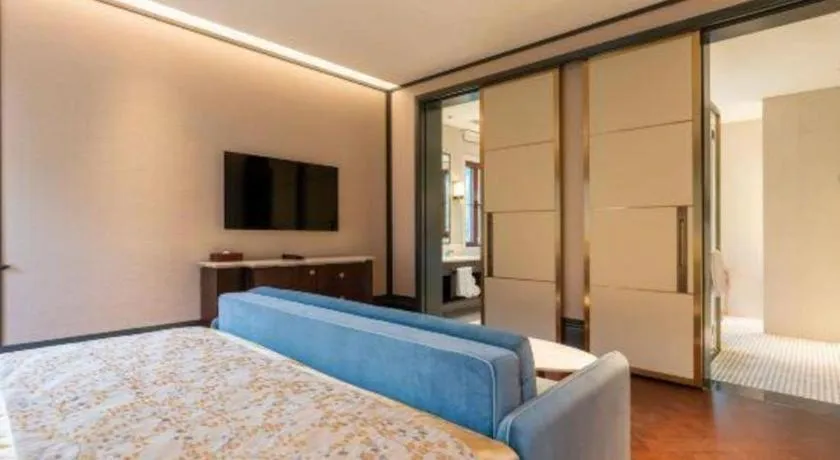 Bed in Grand Bay Hotel Beijing