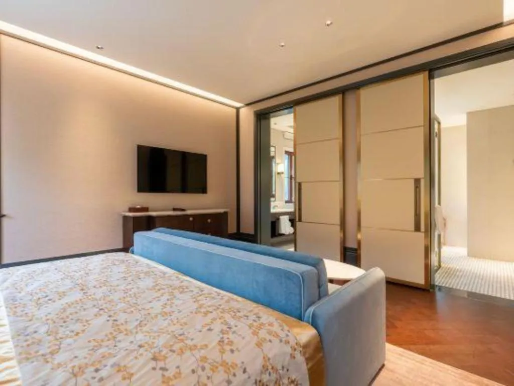 Bed in Grand Bay Hotel Beijing