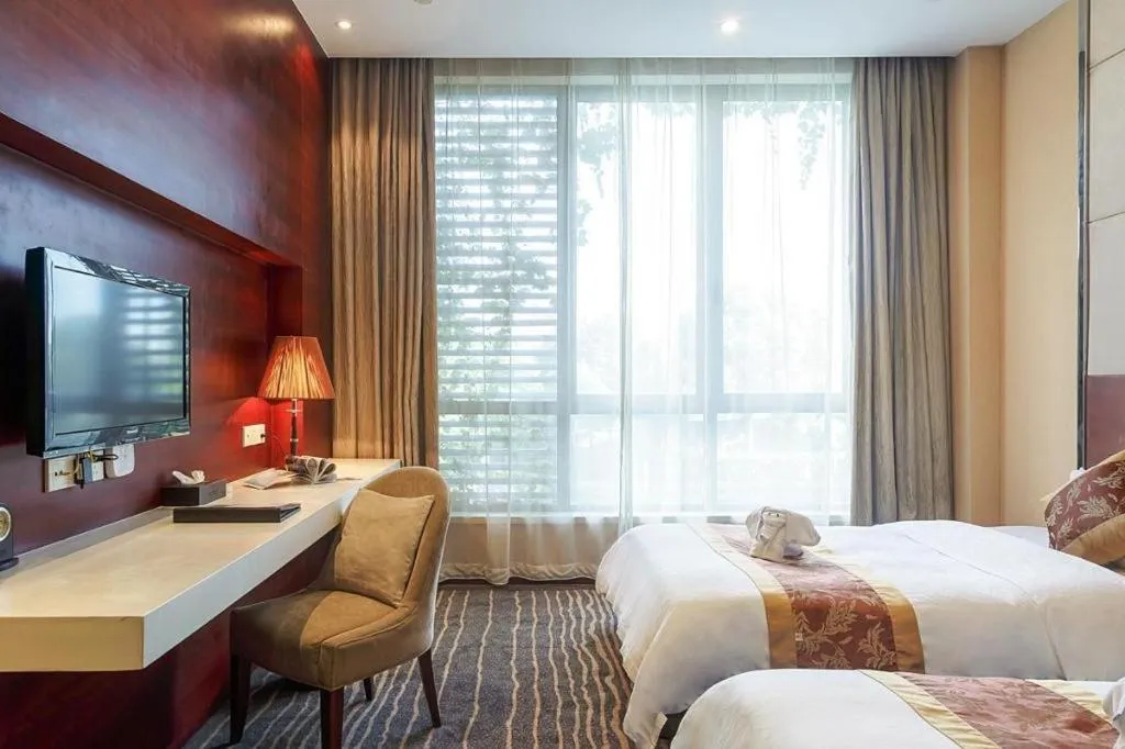 Bed in Suzhou Phoenix Hotspring Resort