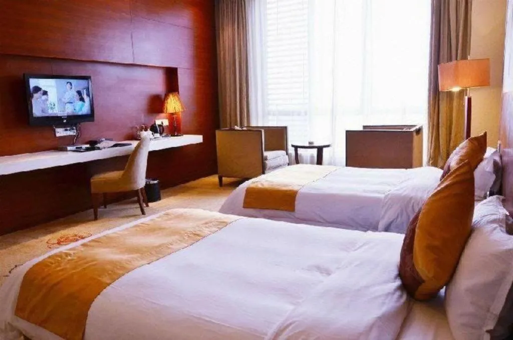 Bed in Suzhou Phoenix Hotspring Resort