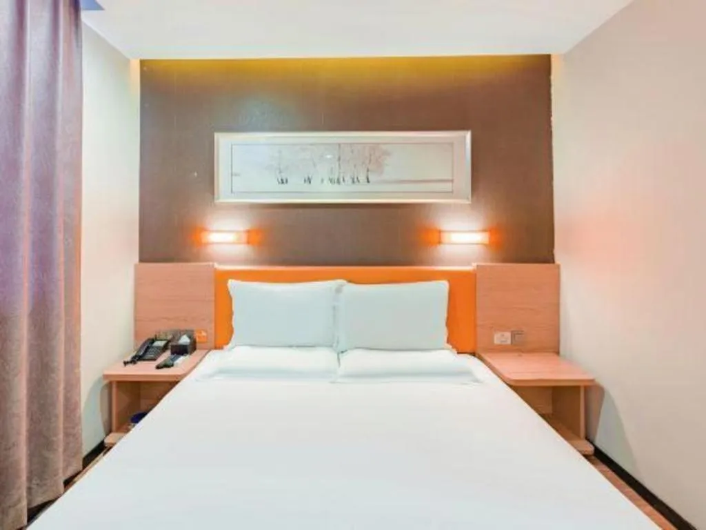 Bed in IU Hotel Tianjin Youyi Road Meijiang Exhibition Meiniu Metro Station