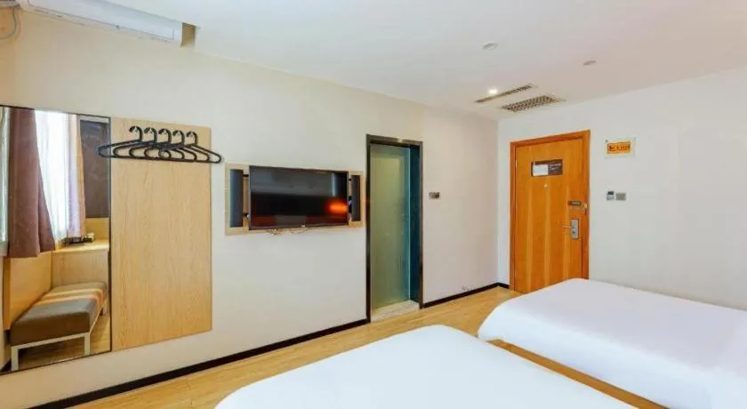 Bed in IU Hotel Tianjin Youyi Road Meijiang Exhibition Meiniu Metro Station