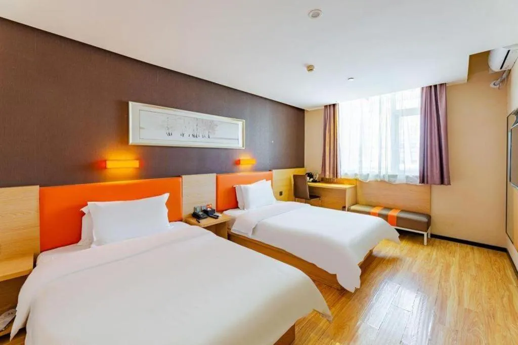 Bed in IU Hotel Tianjin Youyi Road Meijiang Exhibition Meiniu Metro Station
