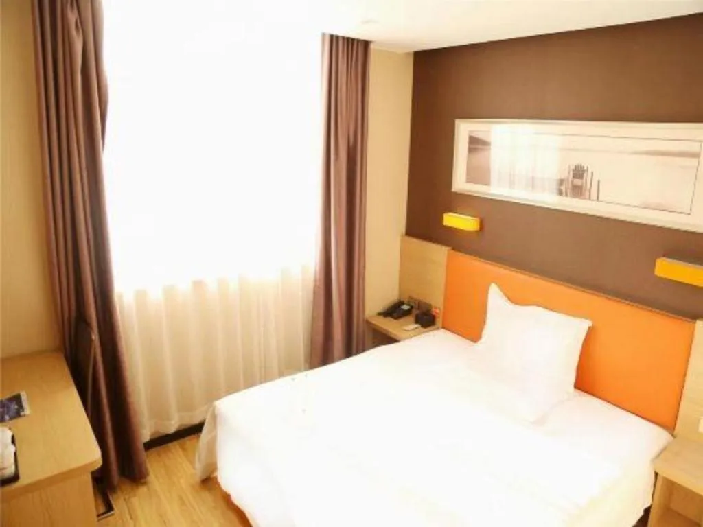 Bed in IU Hotel Tianjin Youyi Road Meijiang Exhibition Meiniu Metro Station