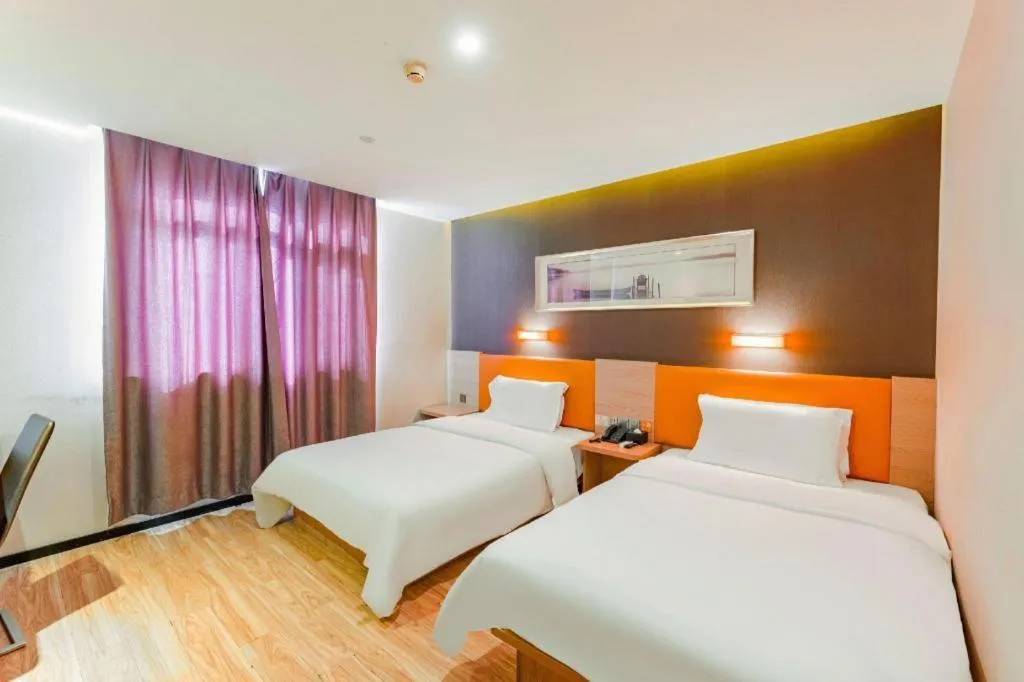 Bed in IU Hotel Tianjin Youyi Road Meijiang Exhibition Meiniu Metro Station