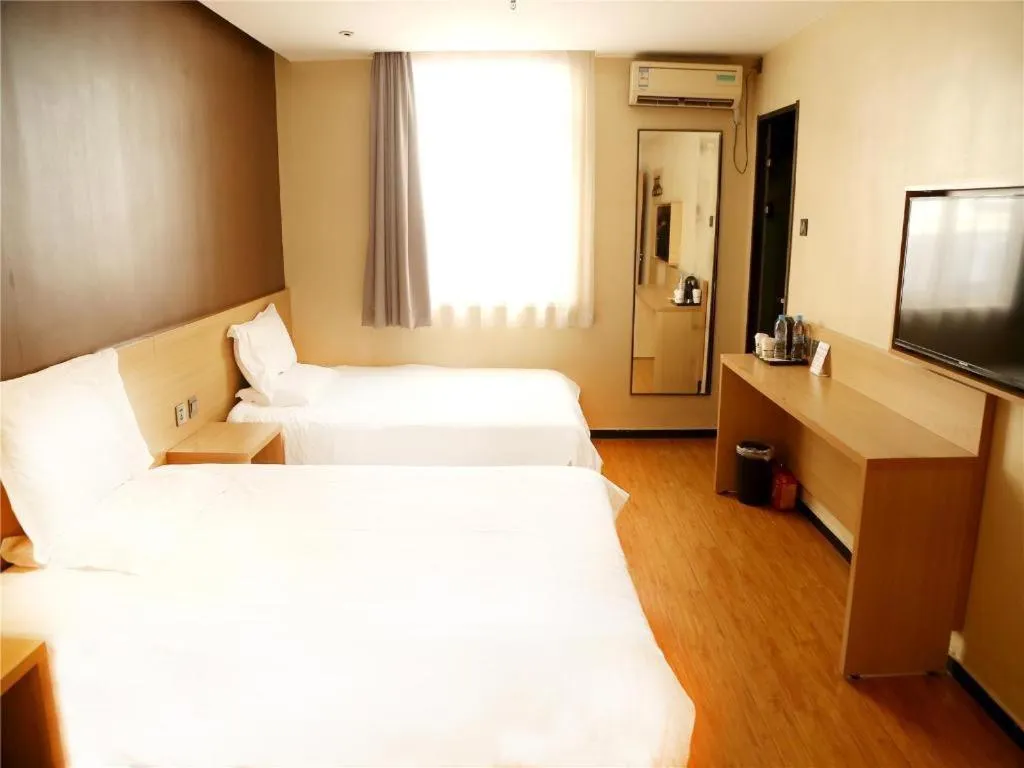 Bed in IU Hotel Tianjin Youyi Road Meijiang Exhibition Meiniu Metro Station