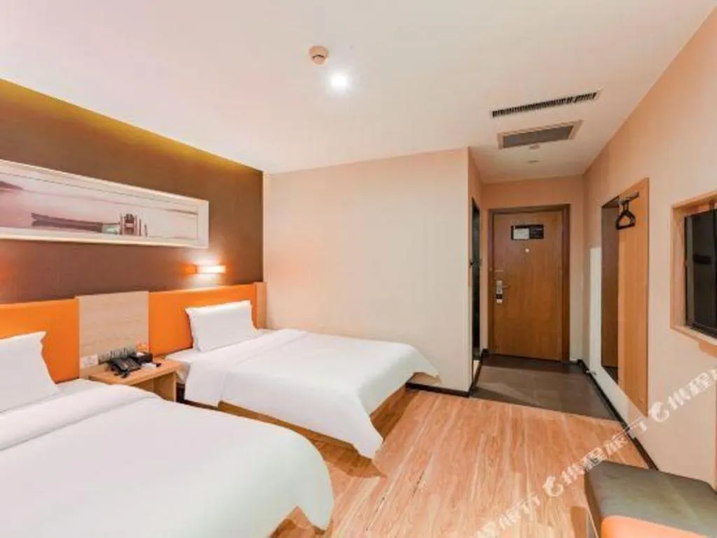 Bed in IU Hotel Tianjin Youyi Road Meijiang Exhibition Meiniu Metro Station