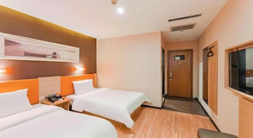 Bed in IU Hotel Tianjin Youyi Road Meijiang Exhibition Meiniu Metro Station